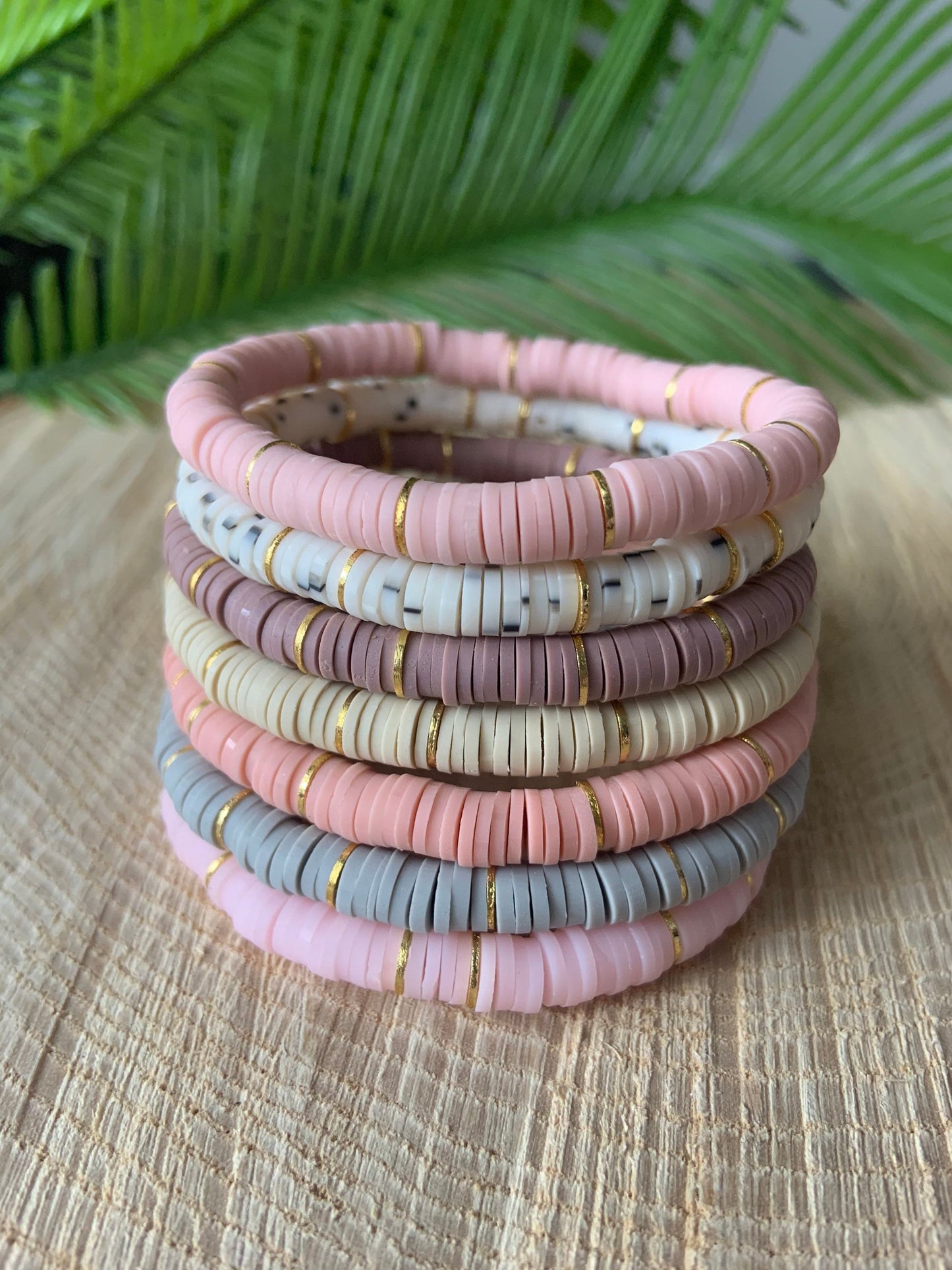 Soft, neutral polymer clay bead and gold disc bracelets