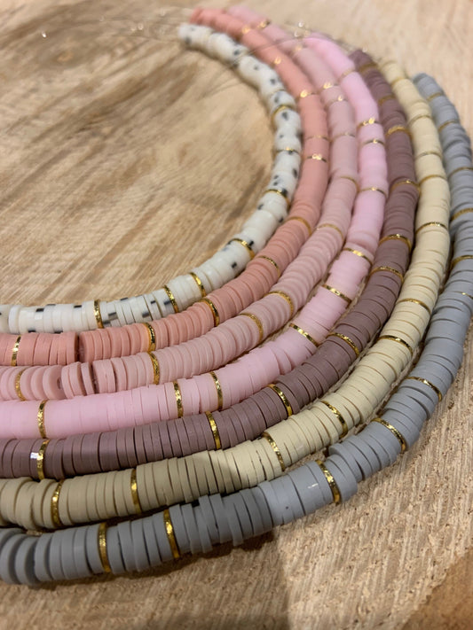 Soft, neutral polymer clay bead and gold disc bracelets