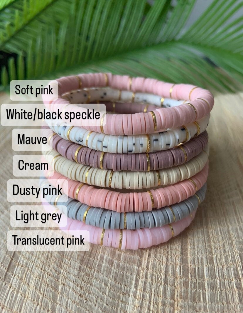 Soft, neutral polymer clay bead and gold disc bracelets